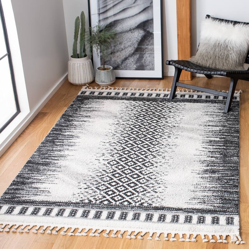 SAFAVIEH Moroccan Tassel Shag Bozhana 0.75-inch Thick Rug - 9' x 12' - Ivory/Black