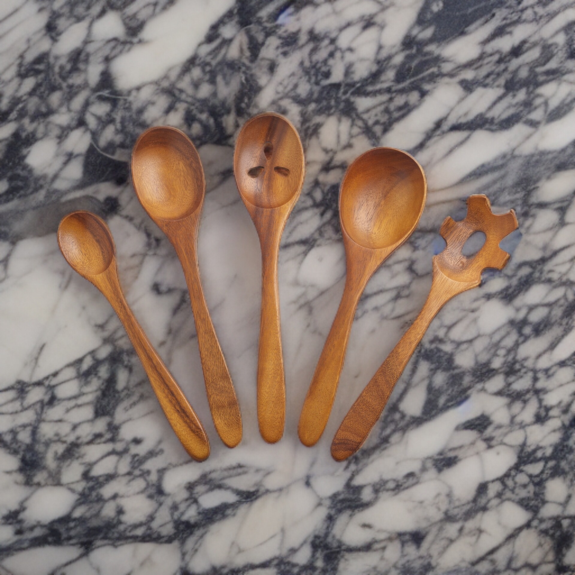 https://ak1.ostkcdn.com/images/products/is/images/direct/9fe1ba019e96a9293b6389c82de23d5208b22a86/Nambe-Tulip-Wood-Kitchen-Tools-5-Piece-Set-Kitchen-Cooking-Utensils.jpg