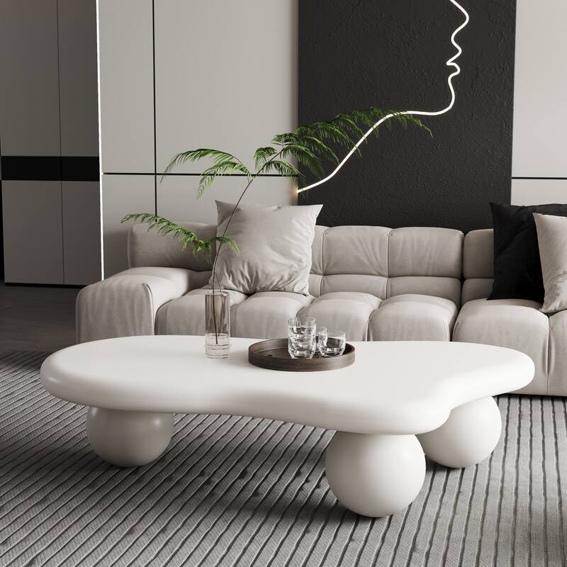 47 Inch Cloud Shaped Coffee Table with 3 Ball Legs for Living Room