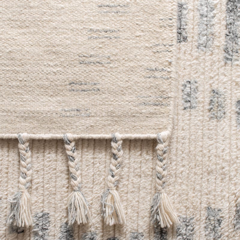 SAFAVIEH Hand-Knotted Casablanca Shag Boginja Tribal Wool Rug