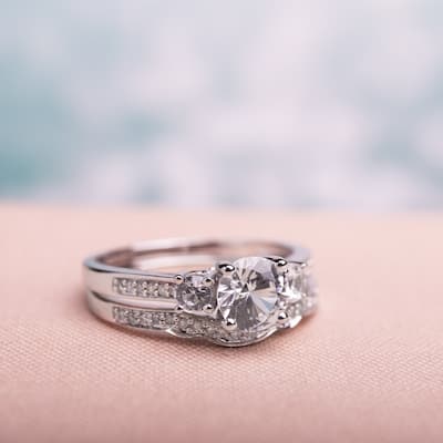 Miadora 10k White Gold Created White Sapphire and 1/6ct TDW Diamond 3-stone Bridal Ring Set (G-H, I2