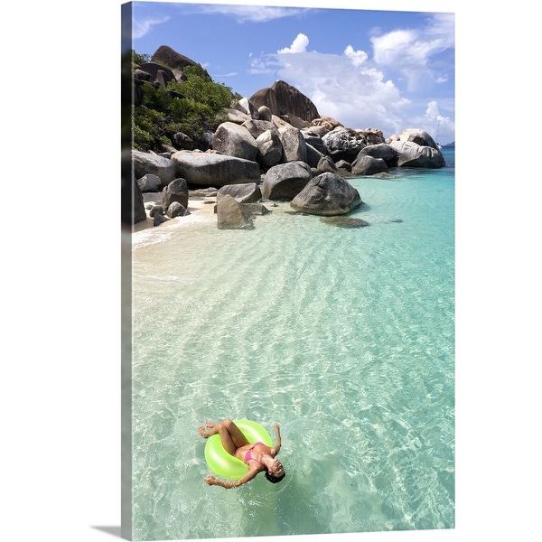 "Woman blissful floating paradise beach" Canvas Wall Art