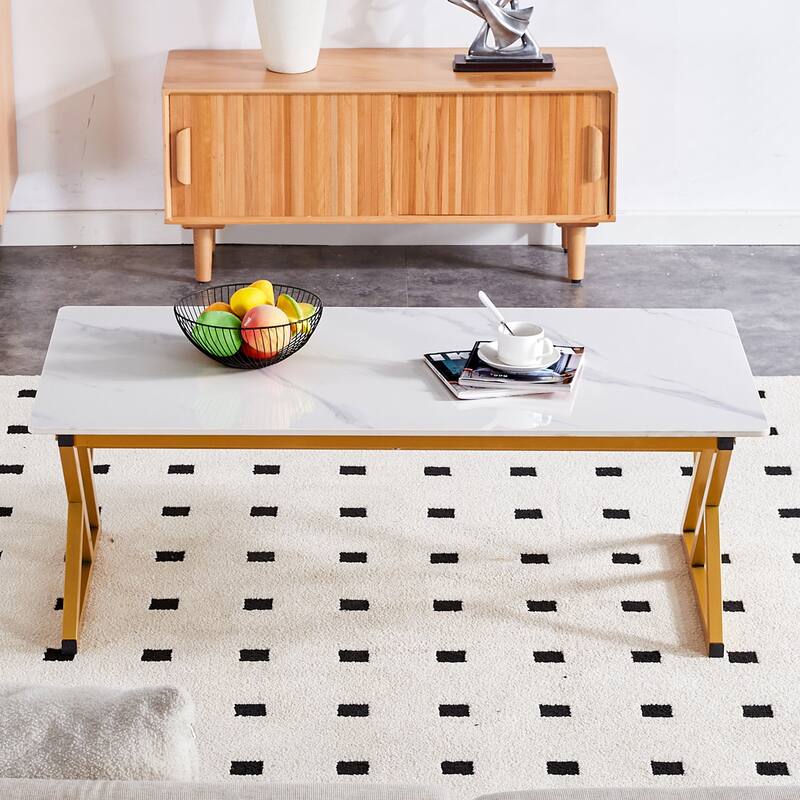 A modern minimalist style marble patterned coffee table with golden metal legs Computer desk Game table Tea table