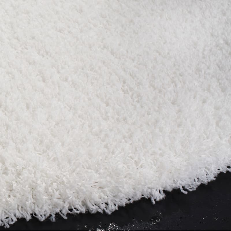 SAFAVIEH Laguna Shag Verdiana Solid Color 2-inch Thick Rug.