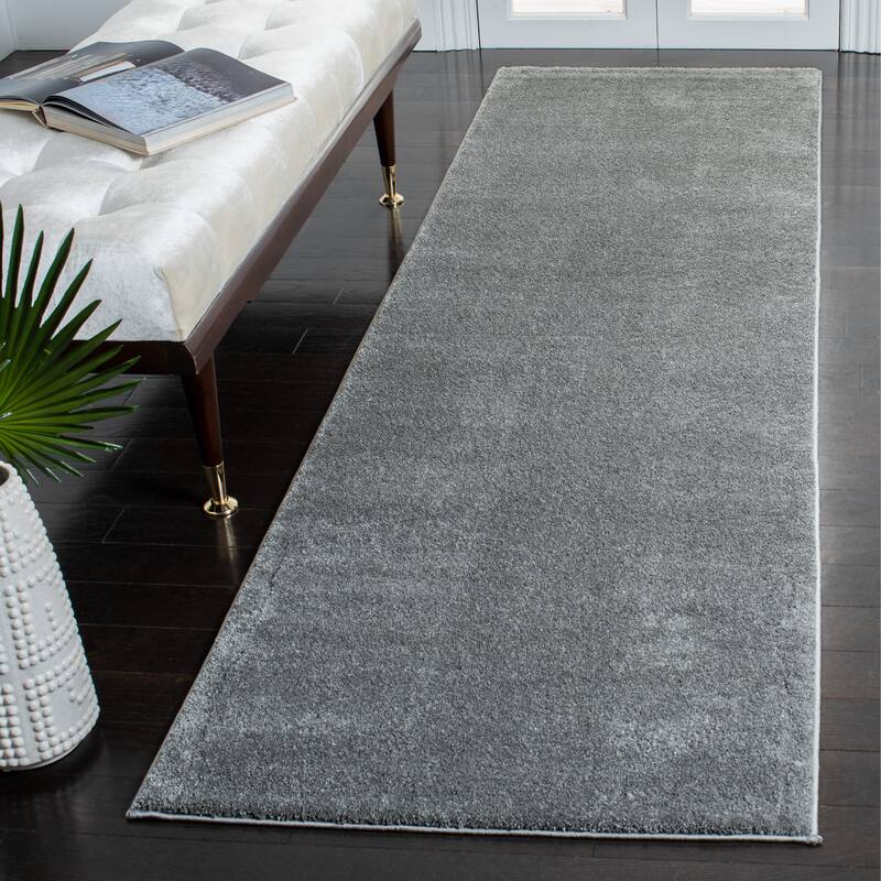 SAFAVIEH, Nonskid Gunde Solid Rug