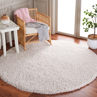 SAFAVIEH Handmade Luxe Shag Gezina Shag Rug