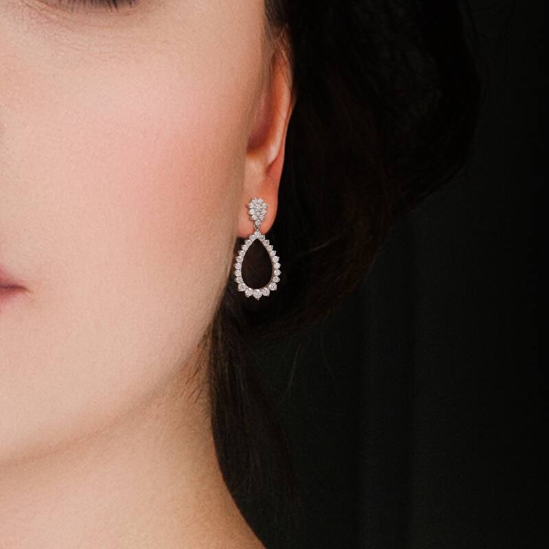 Miadora 2 1/5ct DEW Moissanite Floral Graduated Teardrop Dangle Earrings in Sterling Silver