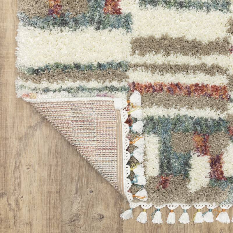 Style Haven Aire Abstract Stripe Ivory/ Multi Shag Tassel Fringe Area Rug.