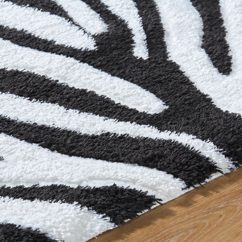 Livabliss Nomadic Animal Print Plush Area Rug