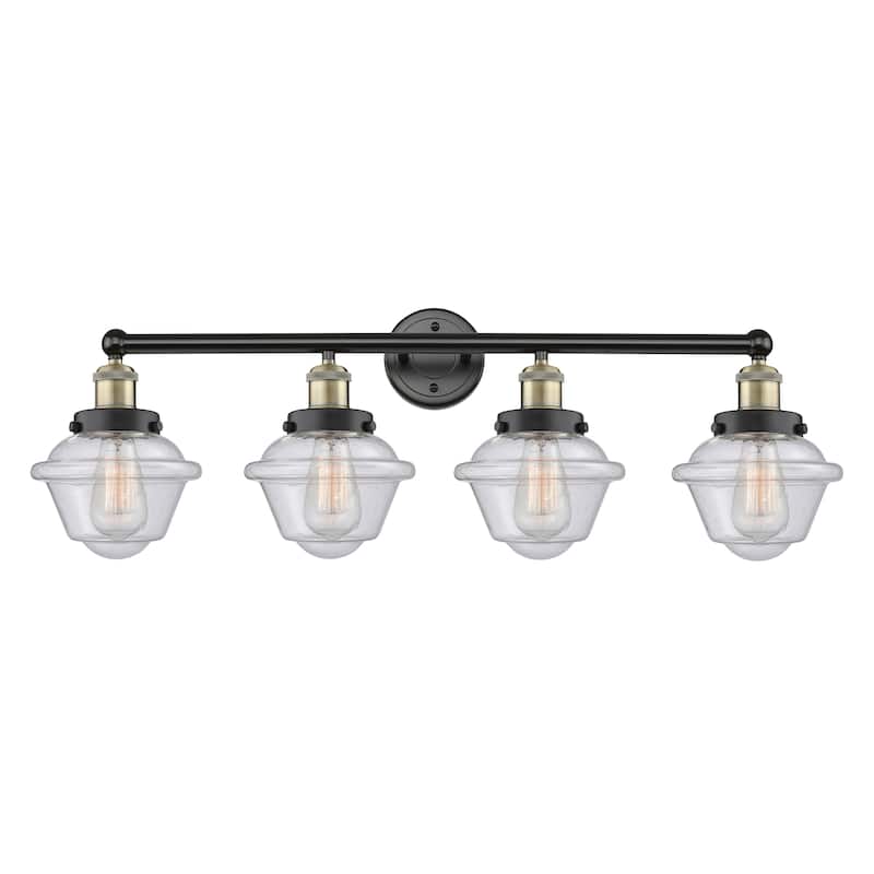 Innovations Lighting Oxford - 4 Light 34" Bath Vanity Light - Black Antique Brass/Seedy