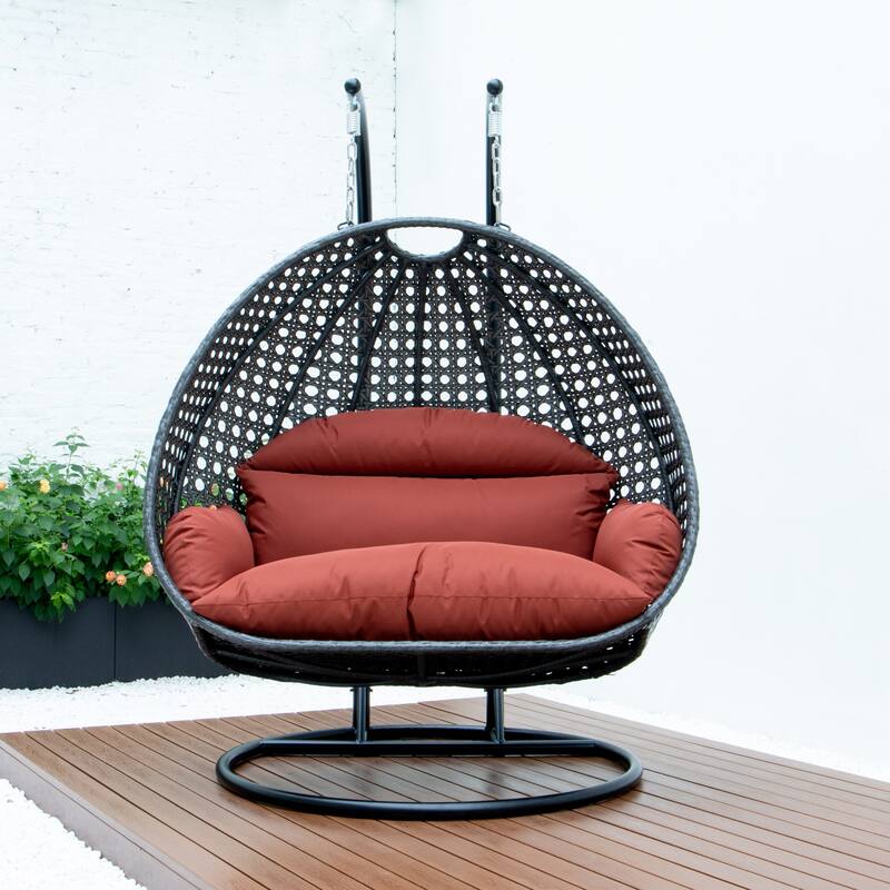 LeisureMod 2-Person Hanging Egg Swing Chair with Metal Stand - Handcrafted Charcoal Wicker, Patio Hammock Lounger with Cushions