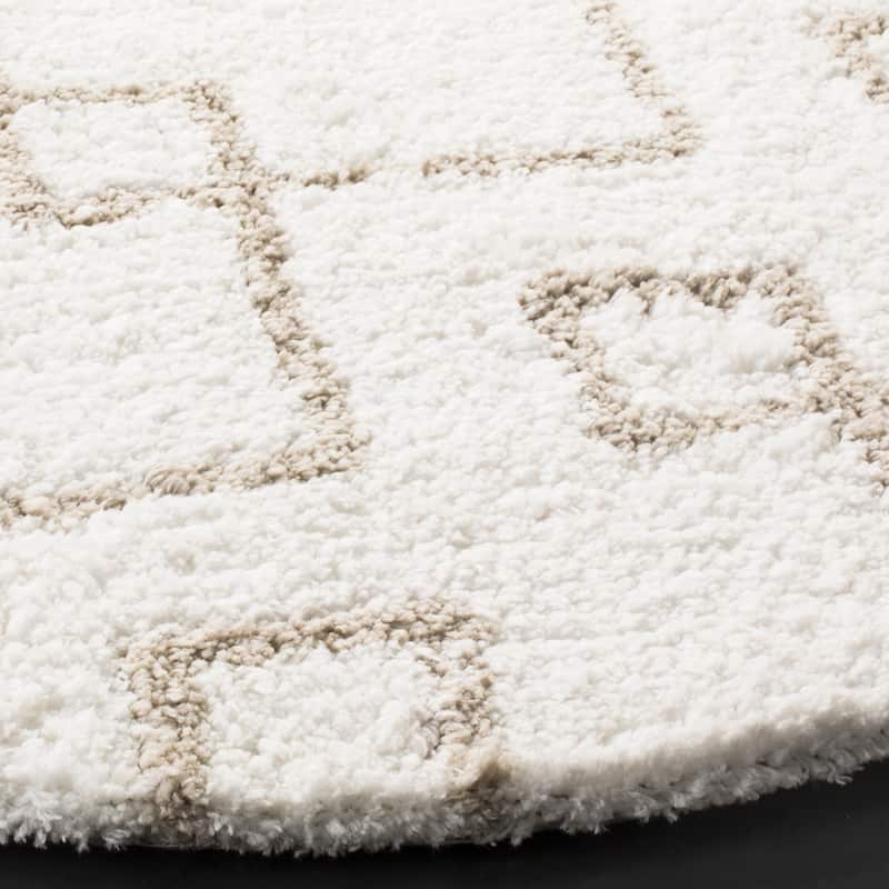SAFAVIEH Handmade Toronto Shag Shaniqua Polyester Rug