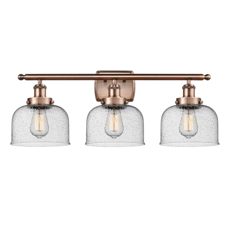 Innovations Lighting 916-3W-13-28 Bell Vanity Bell 3 Light 28" Wide - Antique Copper / Seedy