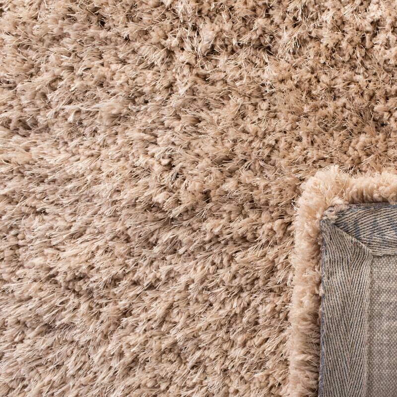 SAFAVIEH Handmade Ryann Shag Anneclaar Solid Polyester Rug