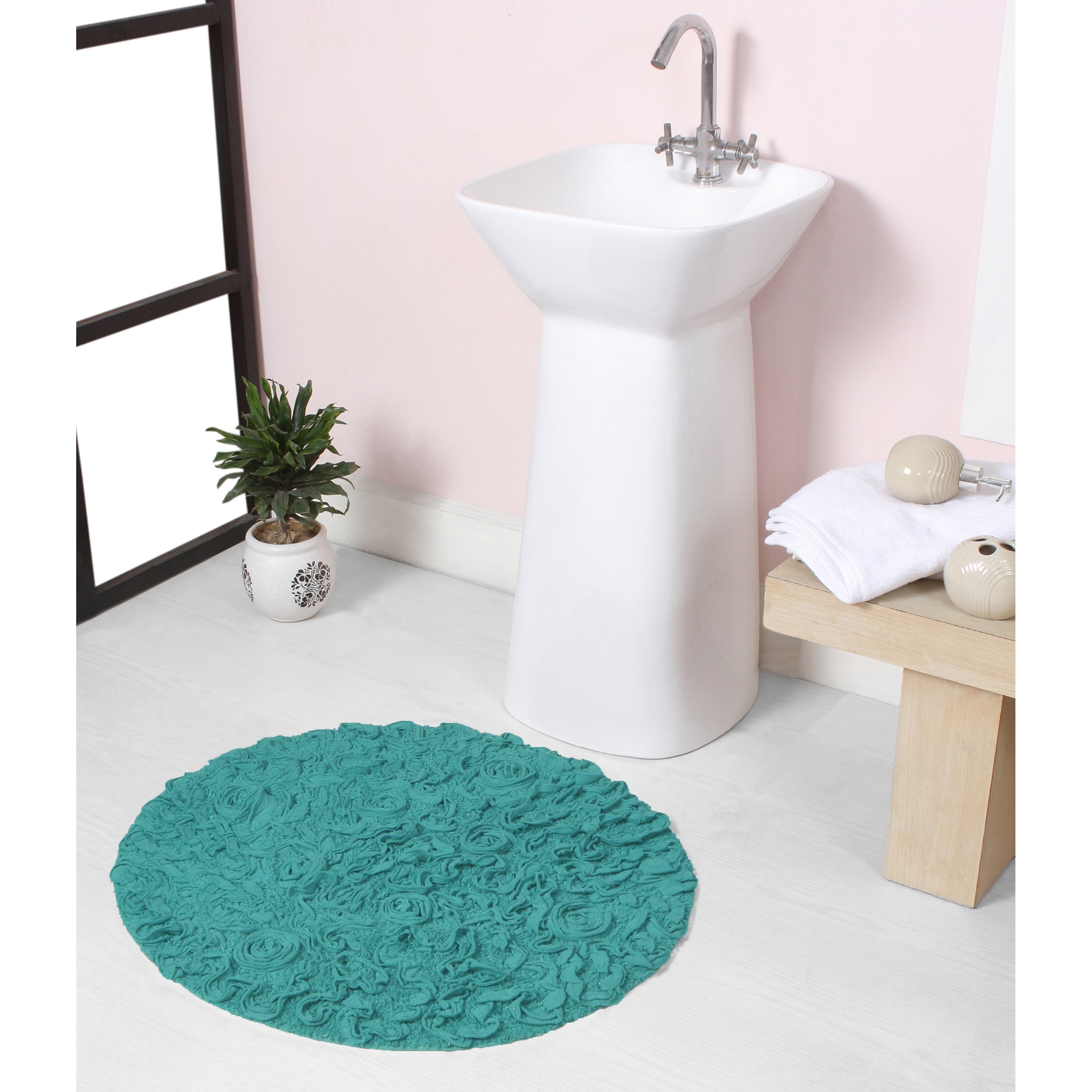 https://ak1.ostkcdn.com/images/products/is/images/direct/a1cda7d973fa354de7f8179c65de7a6fe4ccc1a0/Bell-Flower-Bathroom-Rug%2C-Cotton-Soft%2C-Water-Absorbent-Bath-Rug%2C-Non-Slip-Shower-Rug-Machine-Washable-22%22-Round.jpg