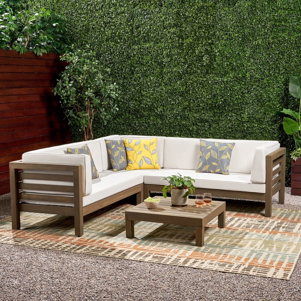 Oana Outdoor 5 Seater V Shaped Mid-Century Modern Acacia Wood Sectional Sofa Set with Coffee Table by Christopher Knight Home