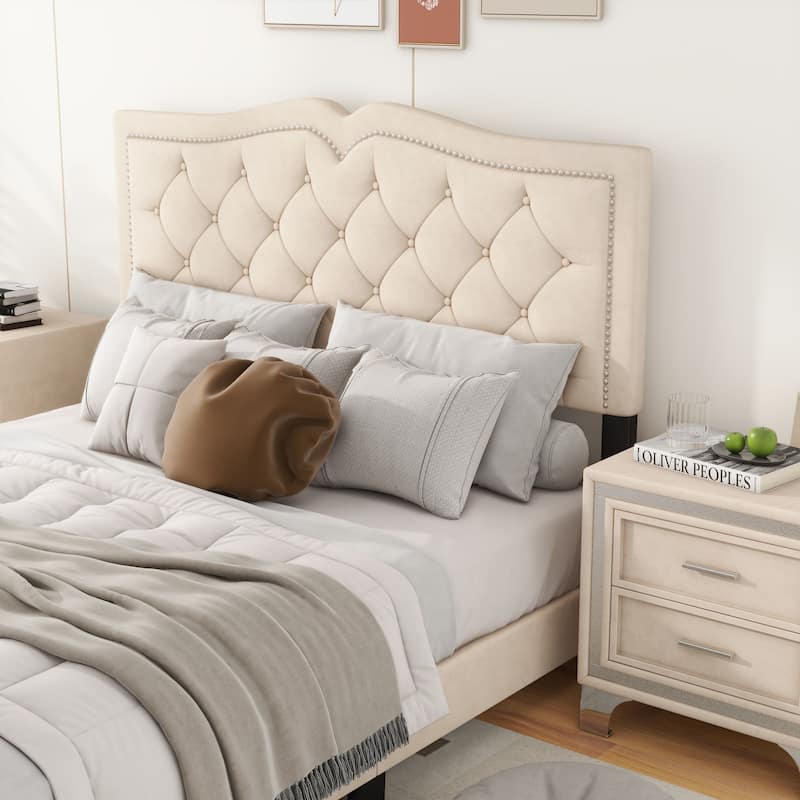 Upholstered bed frame with rivet design