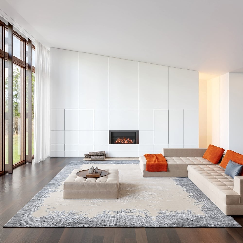 Mera Bordered Wool Area Rug