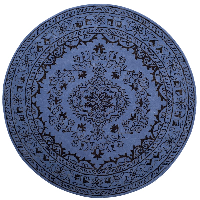 SAFAVIEH Handmade Glamour Gudmundina Modern Viscose Rug