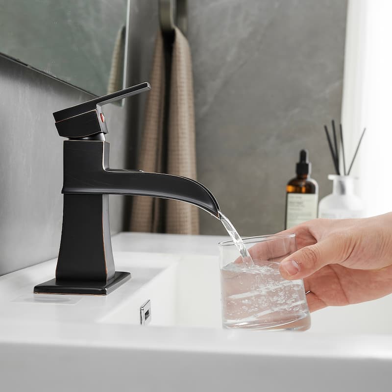 Single-handle Bathroom Waterfall Sink Faucet with Drain and Deckplate