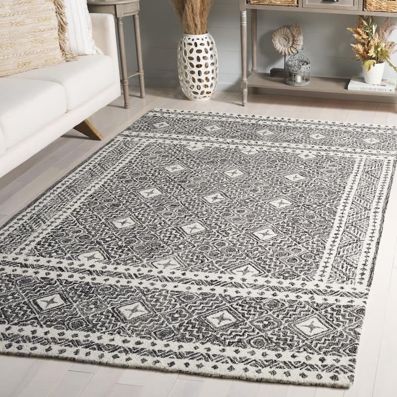SAFAVIEH Handmade Micro-Loop Jelske Wool Rug