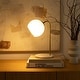 preview thumbnail 5 of 10, Brightech Krystal 14.5 in. Antique Brass Modern LED Arc Desk Lamp with White Glass Globe Shade