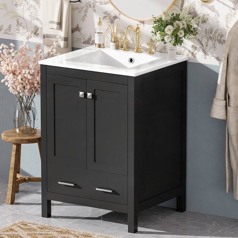 bathroom vanity with integrated undermount basin and a storage cabinet featuring 2 doors and 1 drawer