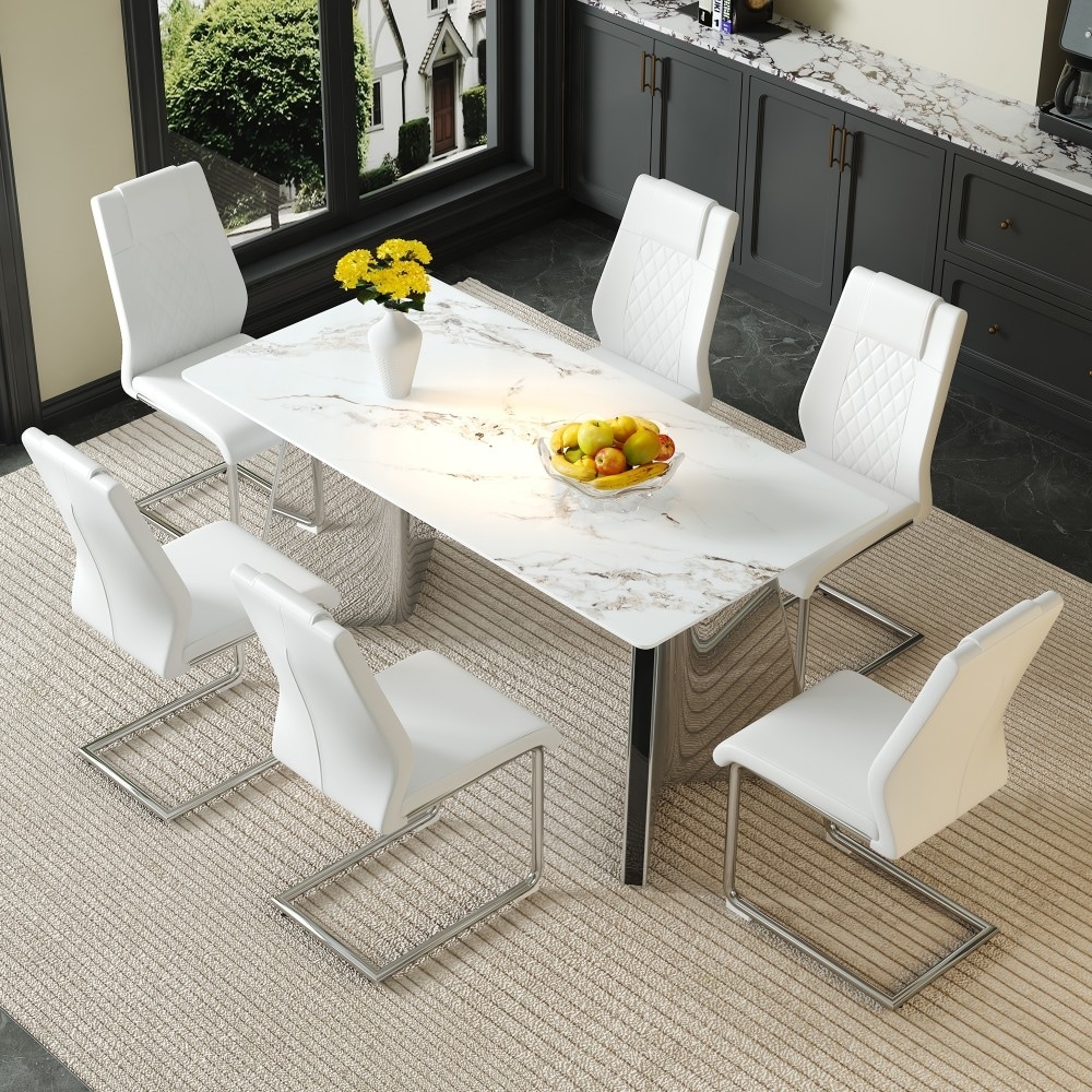 63×31.4 inch Luxurious Cold Jade Sintered Dining Set with 6 White High-quality PU Chairs and Arched Silver Metal Legs