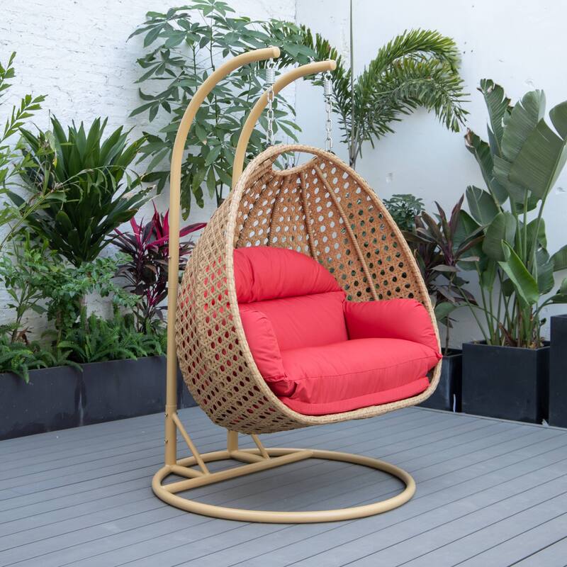 LeisureMod Mendoza 2-Person Hanging Egg Swing Chair - Handcrafted Light Brown Wicker, Patio Hammock Lounger with Cushions - 53"