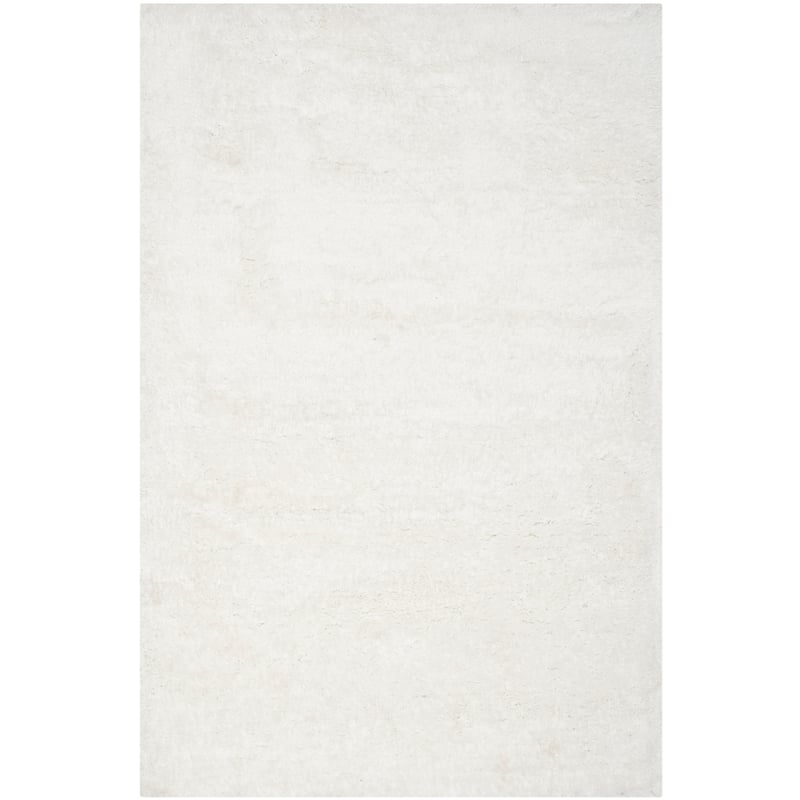 SAFAVIEH Handmade South Beach Leonella Shag Solid Polyester Rug