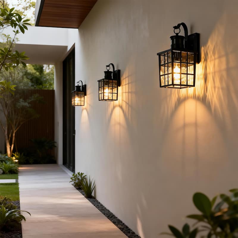 12 in. Matte Black 1-Light Motion Sensing Outdoor Wall Sconce with Dusk to Dawn and Water Wave Glass Shade