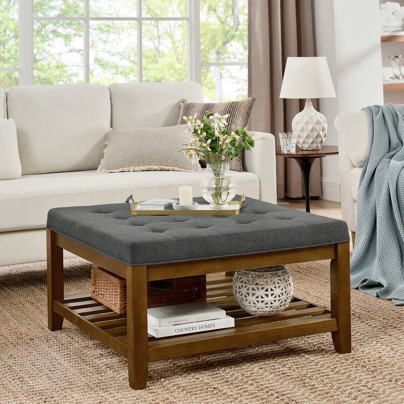 Coffee table with tufted linen upholstery