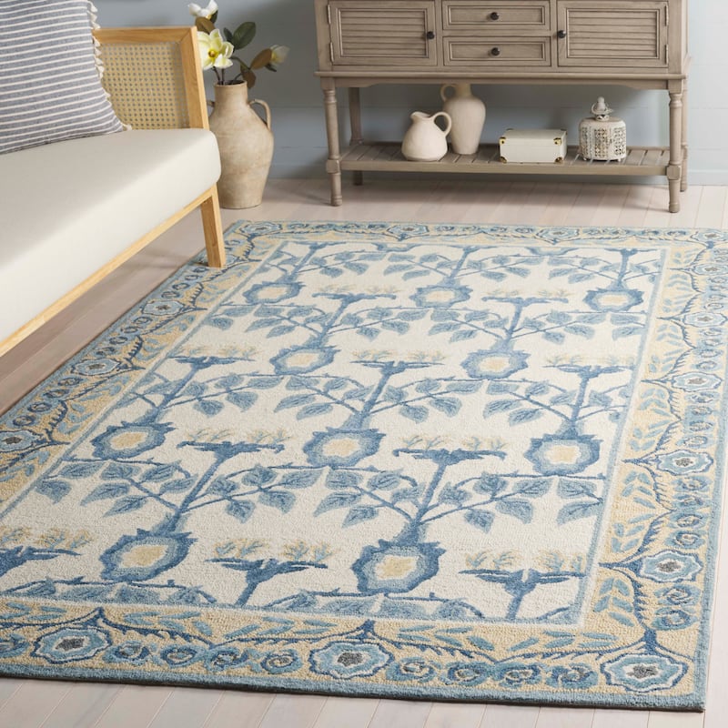 SAFAVIEH Handmade Earthly Treasure Aurelija Traditional Wool Rug - Ivory/Blue - 6' x 9'