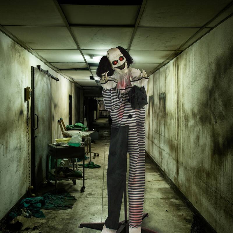 Life-Size Animatronic Talking Clown with Doll with Lights and Sound, Indoor or Covered Outdoor Halloween Decoration