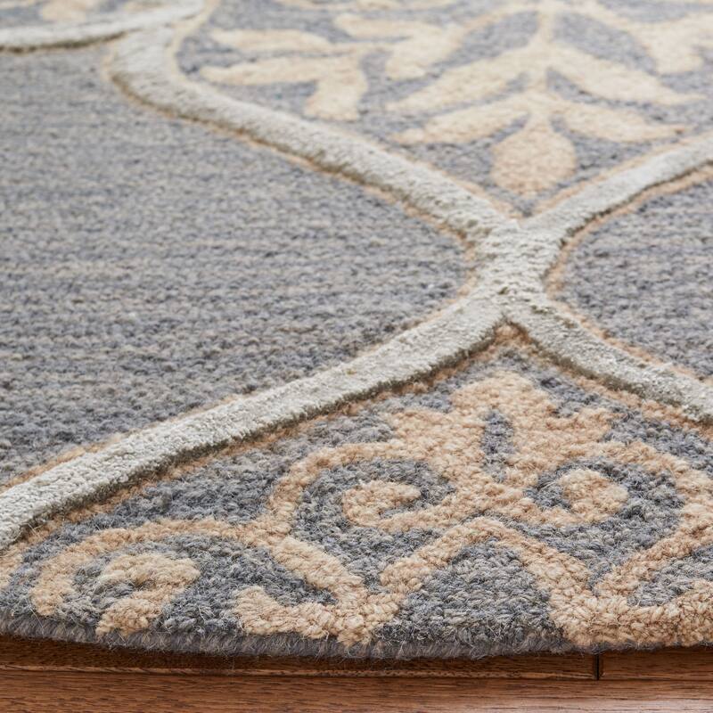 SAFAVIEH Handmade Dip Dye Emeteria Medallion Wool Rug