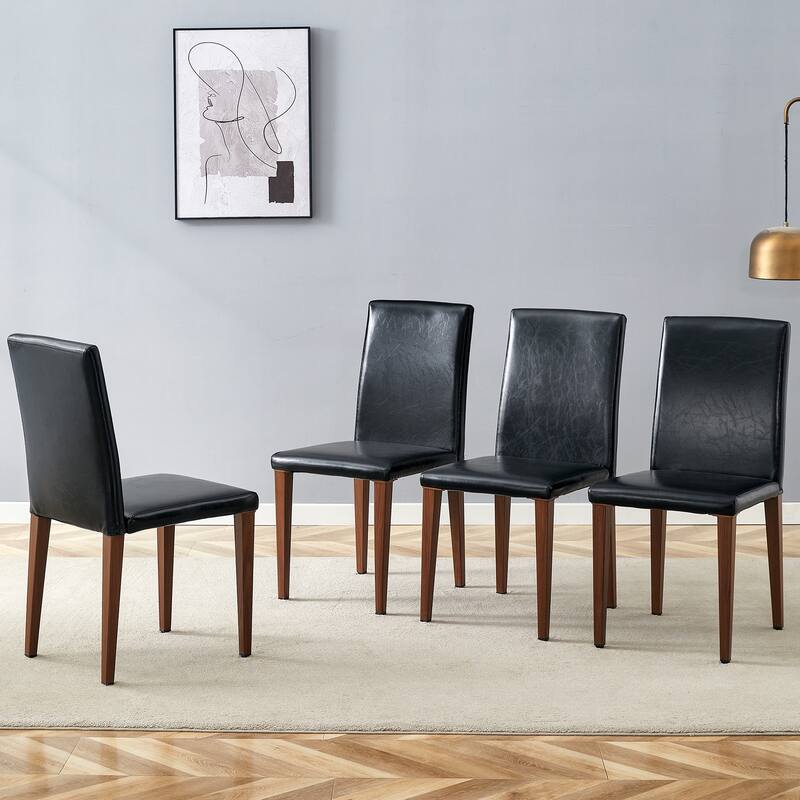 Four black PU dining chairs, simple and versatile, comfortable and accompanied. The exquisite and multifunctional dining