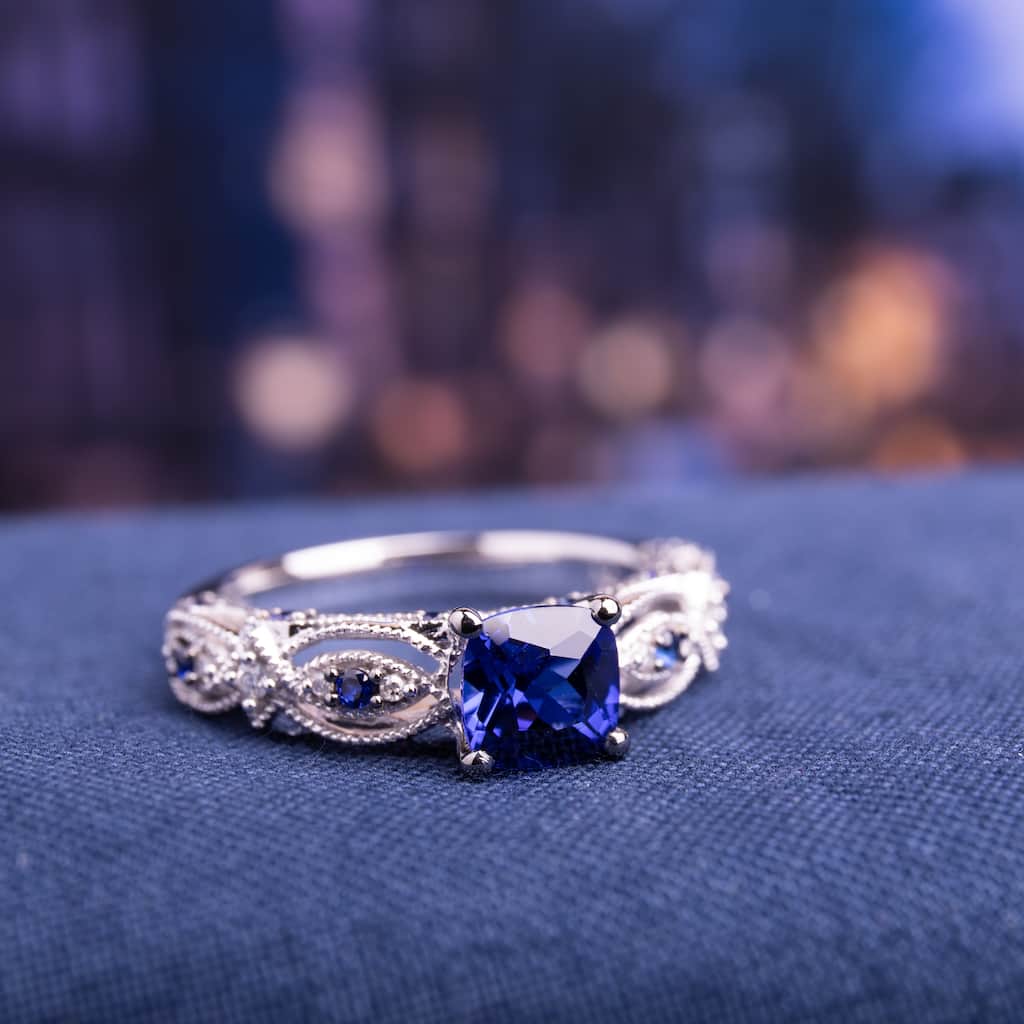 Cushion-cut Created Blue Sapphire and Diamond Vintage Infinity Engagement Ring in 10k White Gold by Miadora