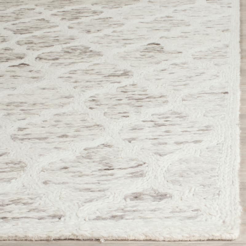 SAFAVIEH Handmade Himalaya Unnie Modern Wool Rug