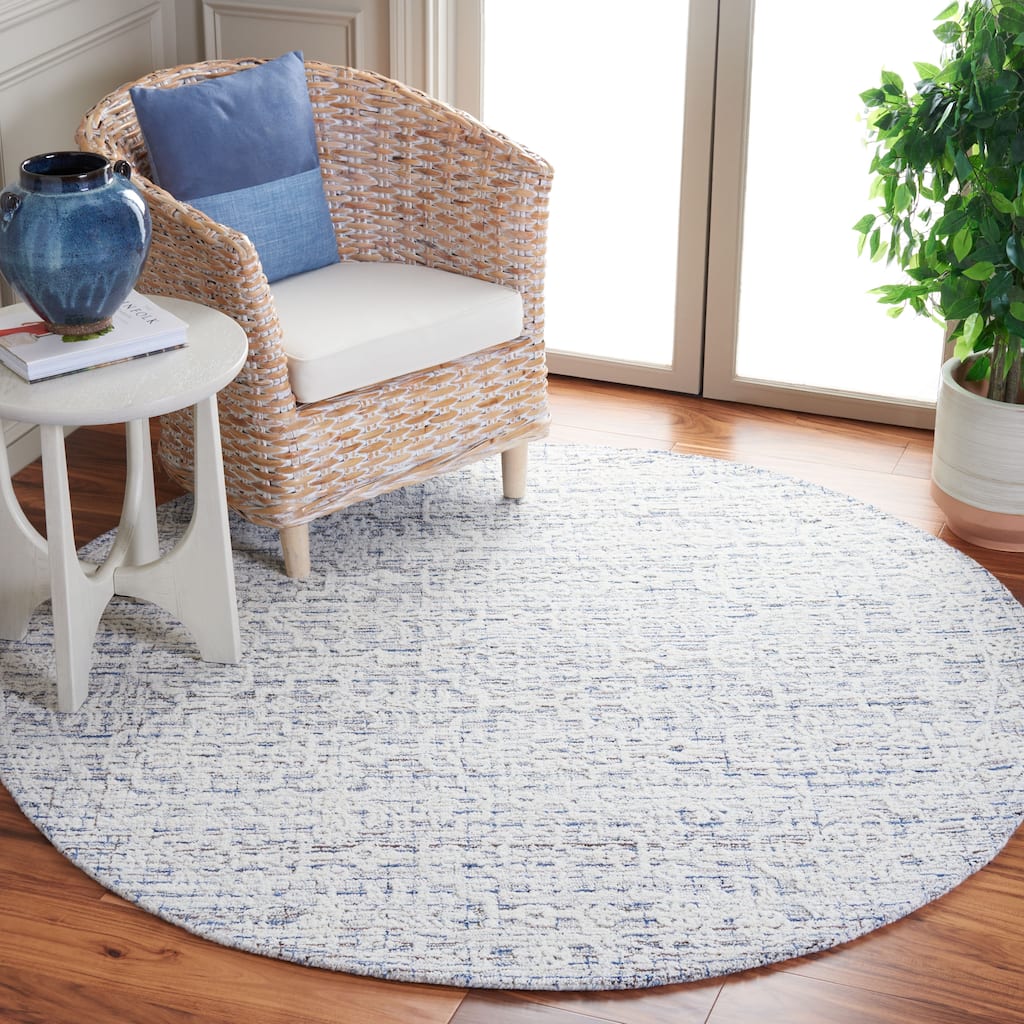 SAFAVIEH Handmade Ebony Pavlinka Modern Wool Rug