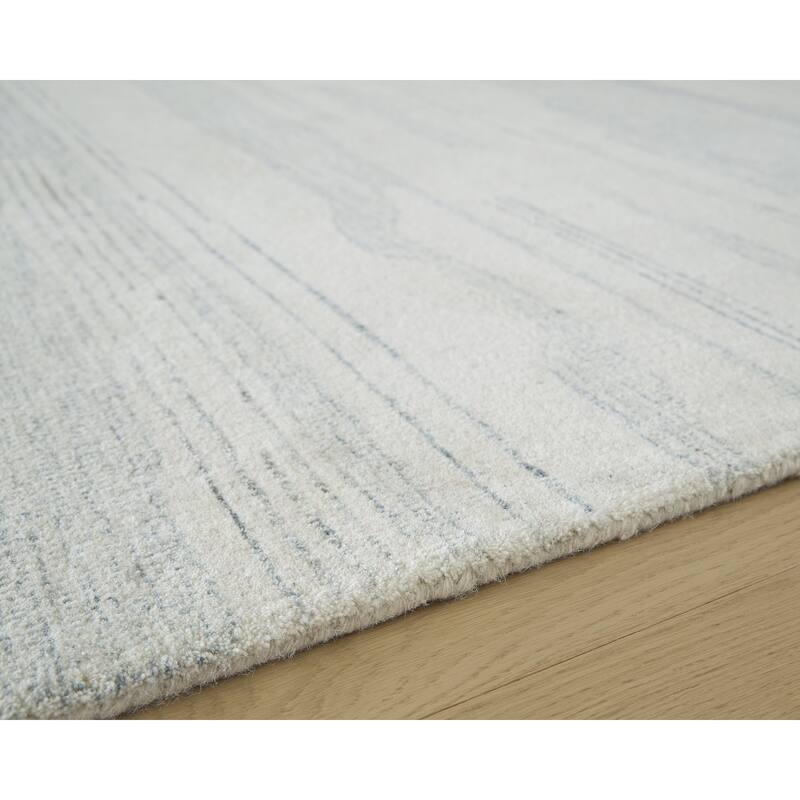 Signature Design by Ashley Genemost Beige/Blue Area Rug