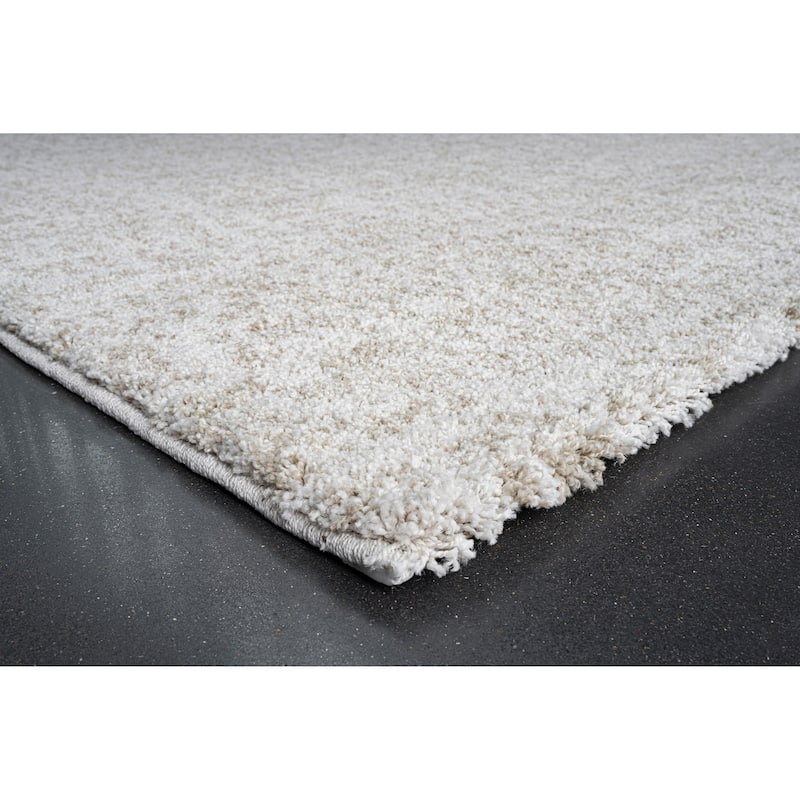 Matilda Ivory and Beige Polypropylene Area Rug - 9' x 12'