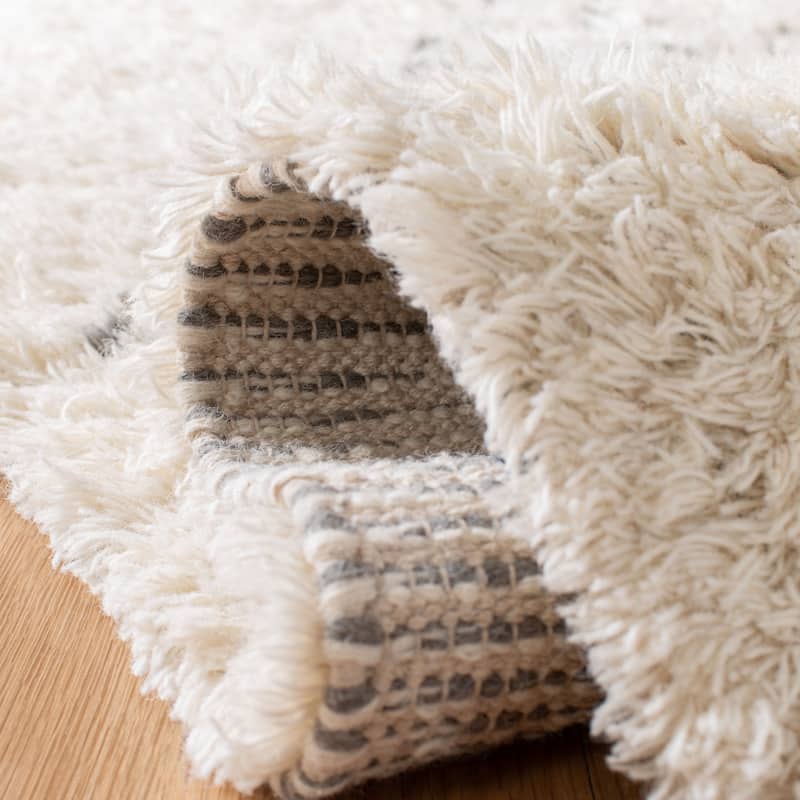 SAFAVIEH Handmade Casablanca Shag Friddora Tribal Wool Rug