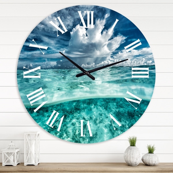 Designart 'Amazing Underwater Seascape and Clouds' Nautical & Coastal wall clock. Opens flyout.