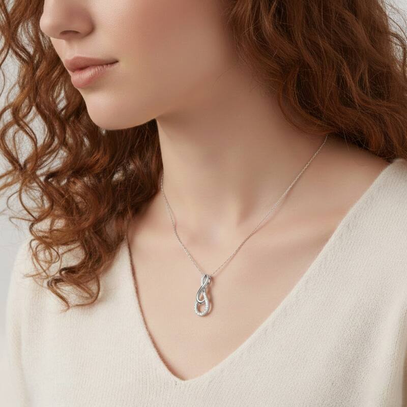 1/10ct TDW Diamond Infinity Pendant Necklace in Silver for Women