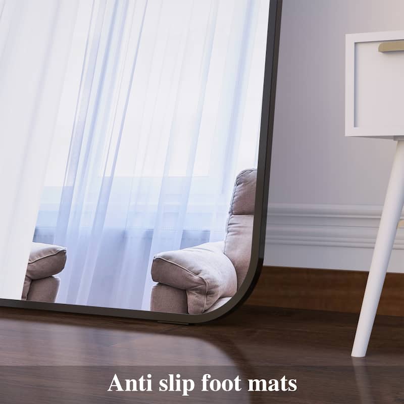 71'' x 32'' Black Arch Full Length Mirror Leaning Against Wall