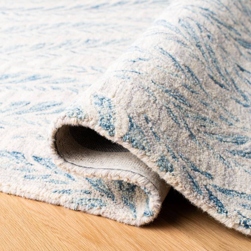 SAFAVIEH Handmade Micro-Loop Maele Modern Wool Rug