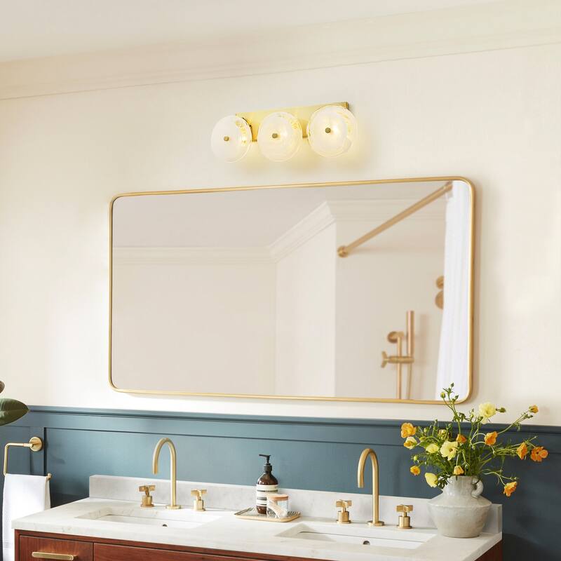 3-Light Mid-Century Modern Brushed Brass Vanity Light with Cloud-Textured Round Glass glass disc