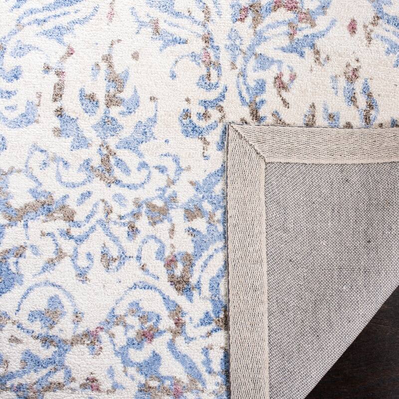 SAFAVIEH Hand-knotted Expression Dagrund Vintage Abstract Viscose Rug