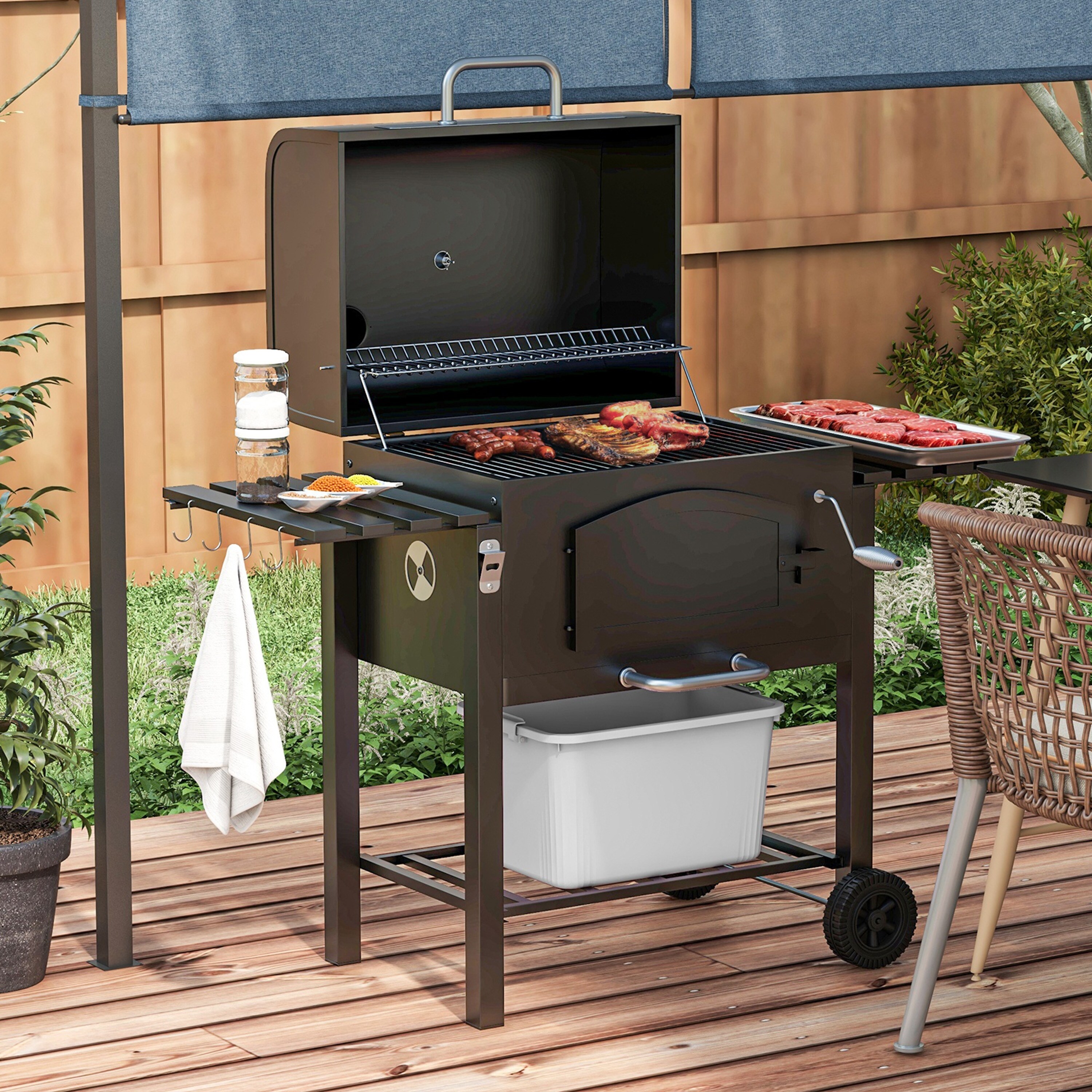 Gas grill with storage outlet