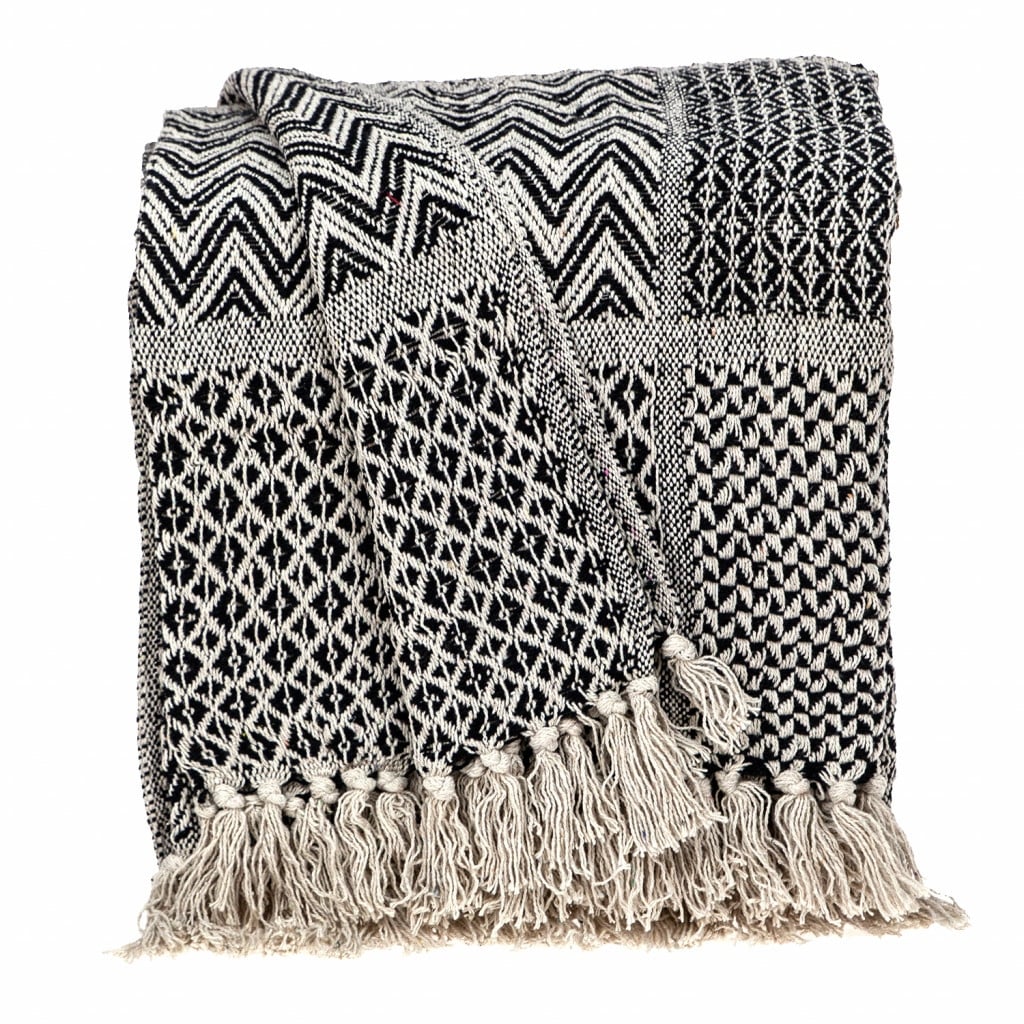 Beige and black 2025 throw